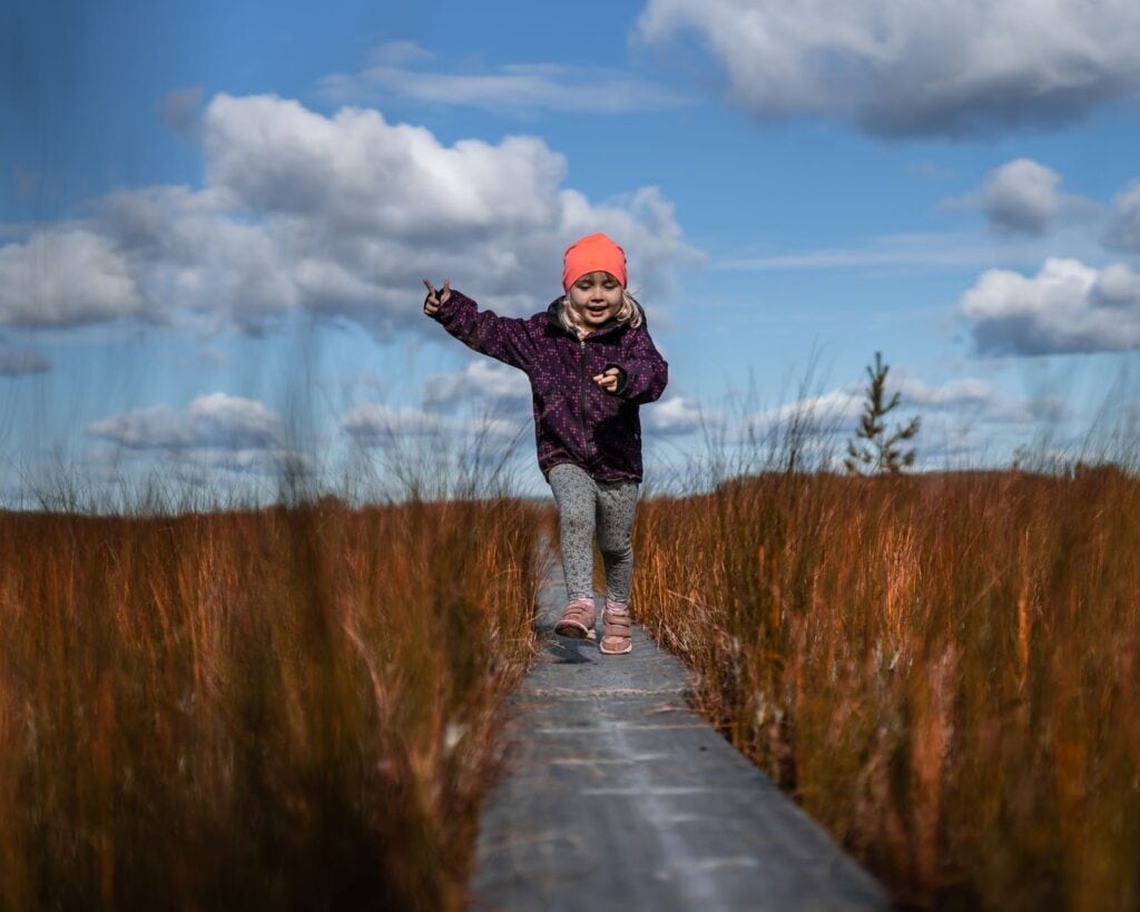 Kid running nature